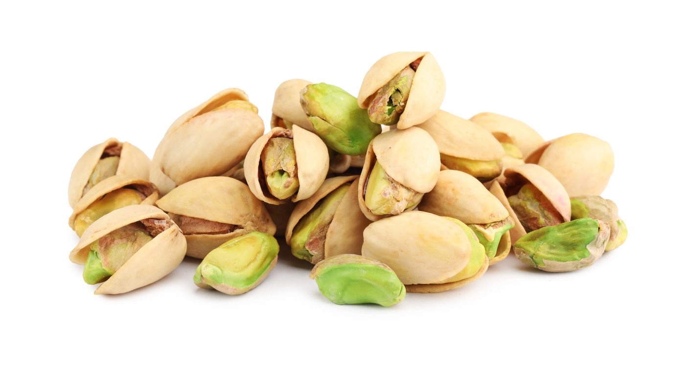 Pistachio nuts in shells on a white background